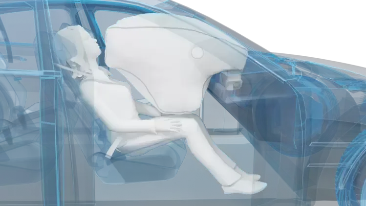 Car interior with deployed airbag and seatbelt