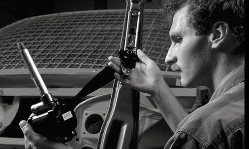 Engineer working on automotive safety component