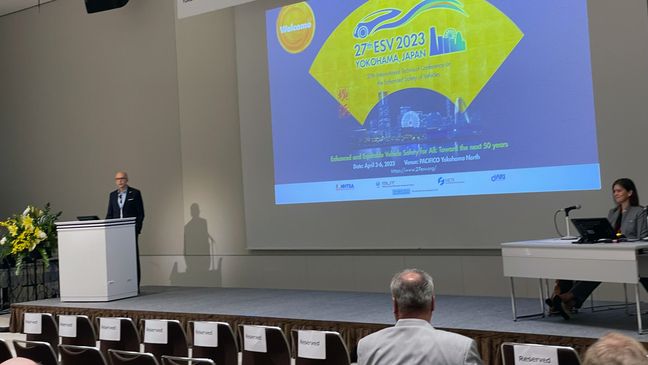 Presenter speaking at 27th ESV conference in Osaka, Japan, April 2023