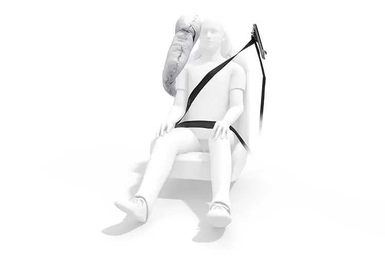 Crash test dummy with seatbelt and airbag