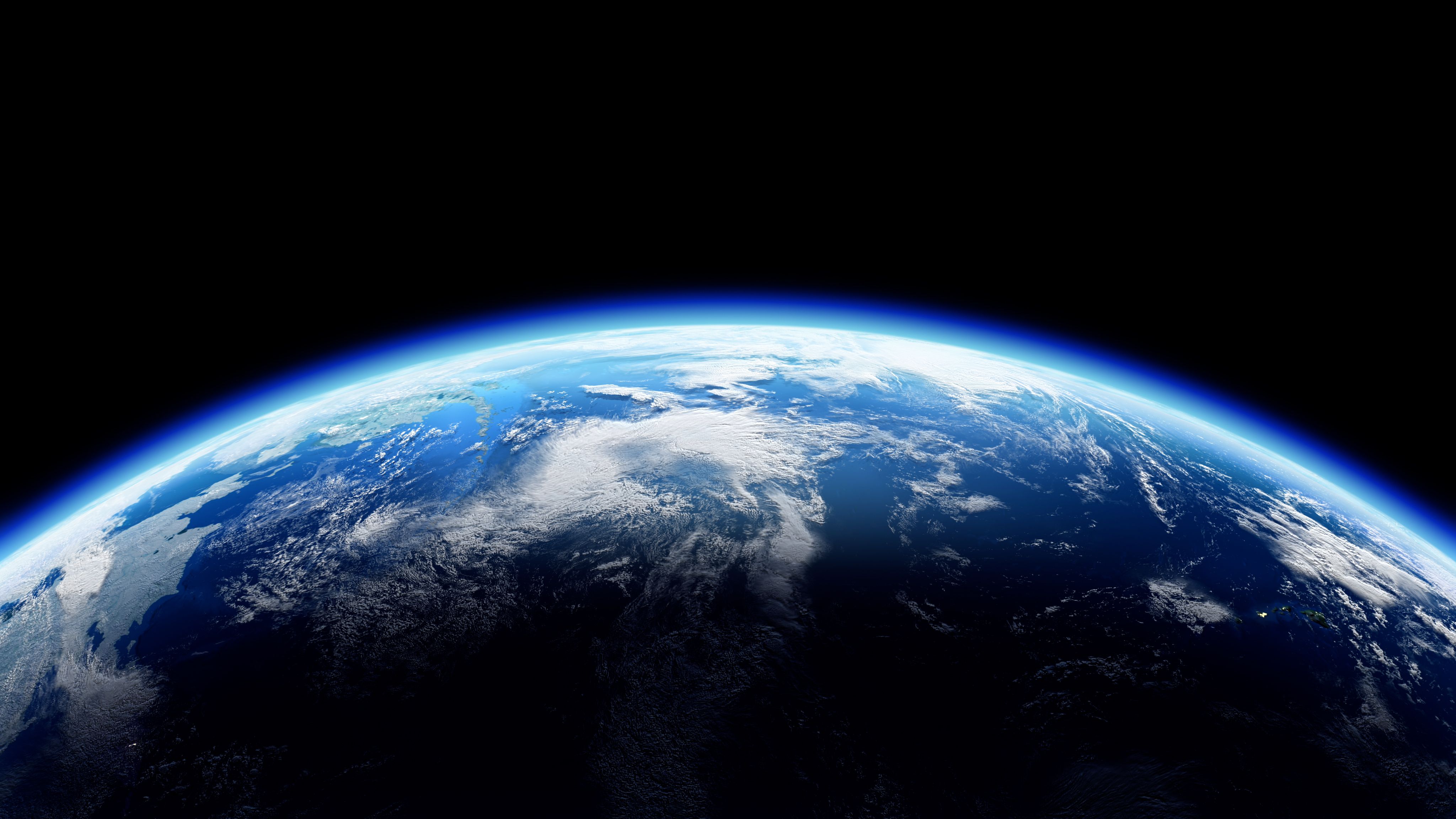 Earth from space, showing clouds and continents