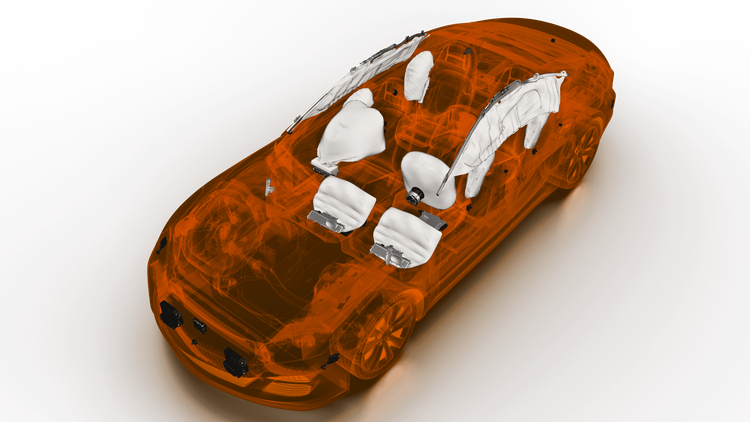 Car interior with deployed airbags and seat belts