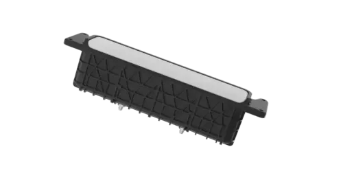 Vehicle safety sensor housing with metallic cover and black base